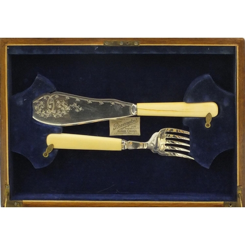 2063 - Bravingtons Six place canteen of silver plated fish knives and forks, with ivory handles