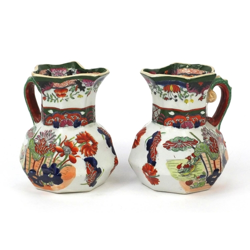 694 - Pair of Mason's iron stone jugs of Oriental design with dragon handles, 15cm high