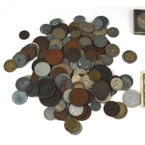 706 - Tin of assorted World coins including half and quarter dollars, British pre decimal examples etc