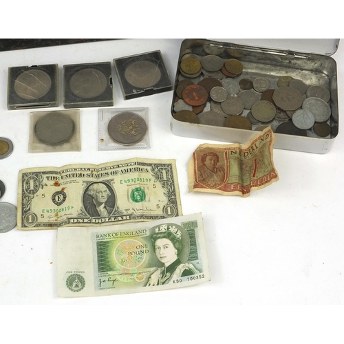 706 - Tin of assorted World coins including half and quarter dollars, British pre decimal examples etc