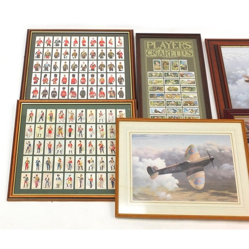 537 - Three framed displays of Military interest cigarette cards and three Military interest airplane prin... 