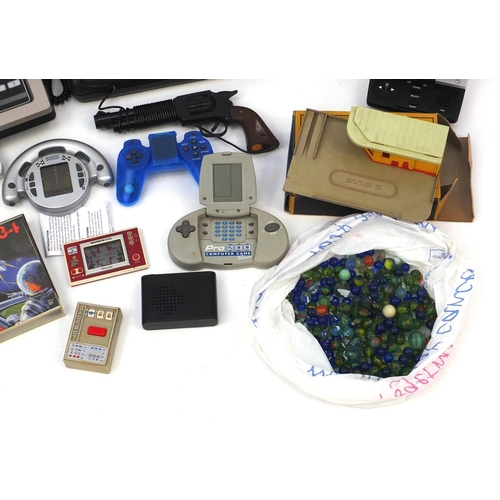 338 - Assorted vintage games and games consoles including Videopac computer, a Mario cement factory game a... 