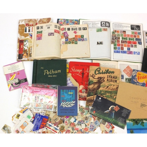 593 - Large selection of assorted World stamps arranged in albums, including some first day covers