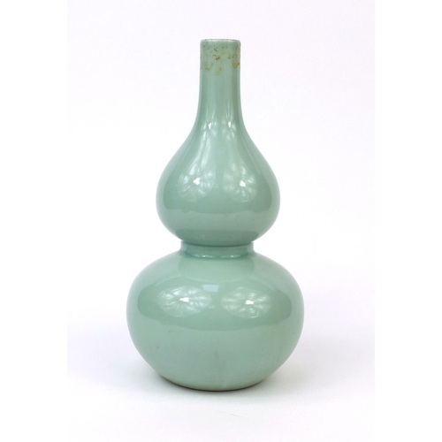 509 - Chinese porcelain celadon glazed vase, of double gourd form, six figure Qianlong character marks to ... 