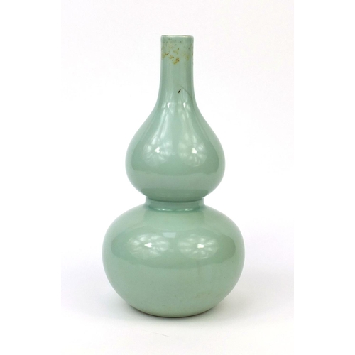 509 - Chinese porcelain celadon glazed vase, of double gourd form, six figure Qianlong character marks to ... 