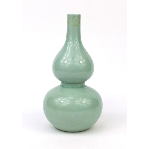 509 - Chinese porcelain celadon glazed vase, of double gourd form, six figure Qianlong character marks to ... 