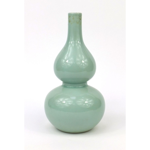 509 - Chinese porcelain celadon glazed vase, of double gourd form, six figure Qianlong character marks to ... 