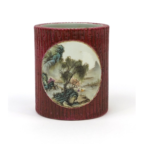 474 - Chinese porcelain Sang De Boeuf glazed brush pot, of naturalist form, with two hand painted famille ... 