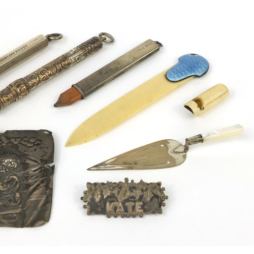 77 - Objects including a 935 silver and guilloche enamelled letter opener with ivorine blade, S Mordan & ... 