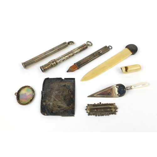 77 - Objects including a 935 silver and guilloche enamelled letter opener with ivorine blade, S Mordan & ... 