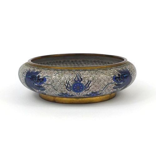 558 - Oriental cloisonné bowl decorated with a dragons amongst a flaming pearl and clouds, 20cm in diamete... 