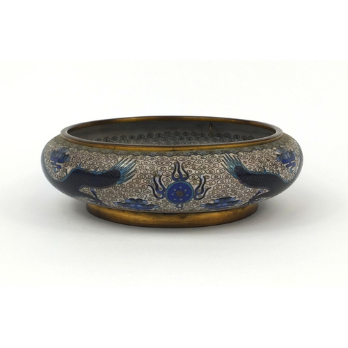 558 - Oriental cloisonné bowl decorated with a dragons amongst a flaming pearl and clouds, 20cm in diamete... 