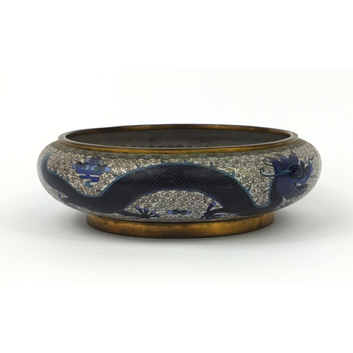 558 - Oriental cloisonné bowl decorated with a dragons amongst a flaming pearl and clouds, 20cm in diamete... 