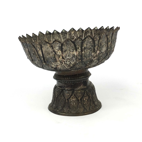 611 - Burmese silver pedestal bowl with stylised decoration, script to the interior, 12cm high x 16cm in d... 