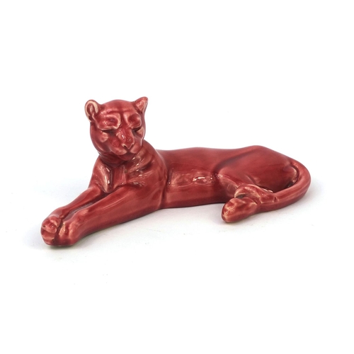 720 - Mintons pink glazed reclining panther, factory marks to the base, 21cm in length