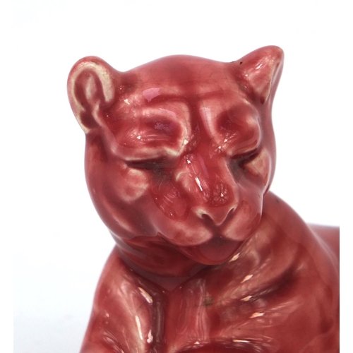 720 - Mintons pink glazed reclining panther, factory marks to the base, 21cm in length