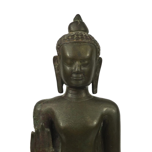 605 - Antique Thai patinated bronze standing figure of Buddha, on a later wooden stand, overall 61cm high