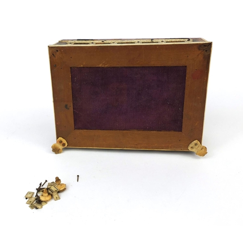 628 - 19th century Anglo Indian tortoiseshell and bone mounted casket, on paw feet, the pierced bone panel... 