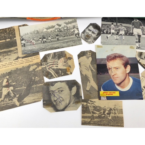 148 - Extensive collection of football autographs, housed in three albums all signed on newspaper clipping... 