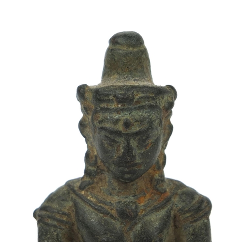 607 - Antique Thai Bronze figure raised on a later wooden base, overall 15.5cm high