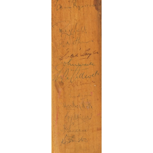 140 - Two 1950's ink signed miniature Gradidge of London cricket bats, one signed by the 1956-57 South Afr... 