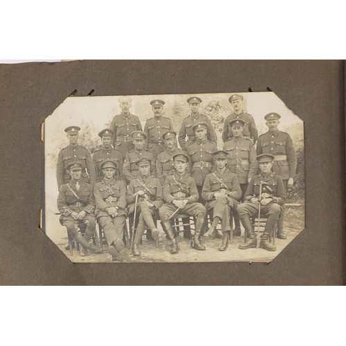 322 - Album of Military interest Royal Sussex Regiment related postcards, some photographic, including exa... 