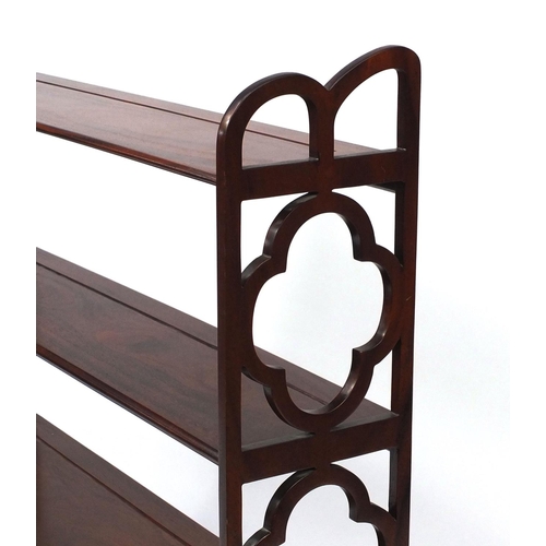 2029 - Mahogany wall hanging shelving unit fitted with four shelves and two drawers to the base, 88cm x hig... 