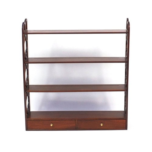 2029 - Mahogany wall hanging shelving unit fitted with four shelves and two drawers to the base, 88cm x hig... 