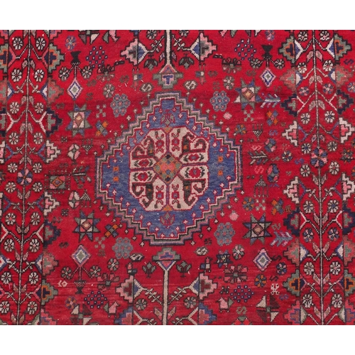 2008 - Rectangular Persian Qashqai rug, the central field decorated with animals and floral motifs onto a p... 