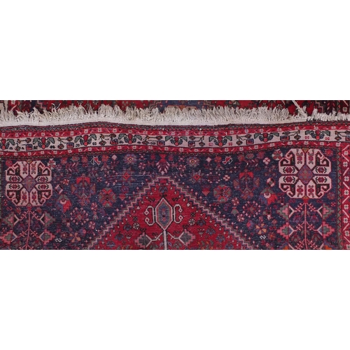 2008 - Rectangular Persian Qashqai rug, the central field decorated with animals and floral motifs onto a p... 