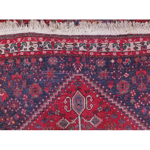 2008 - Rectangular Persian Qashqai rug, the central field decorated with animals and floral motifs onto a p... 