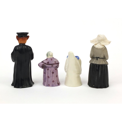 687 - Four Royal Worcester porcelain candle snuffers, together with two others, including one of a Nunn, t... 