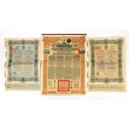 222 - Three Government share certificates, comprising a Chinese examples with bonds and two Russian exampl... 