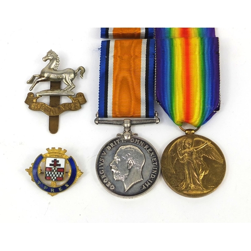 247 - British Military World War I Victory and 1914-18 War medal, together with two badges, the medals awa... 