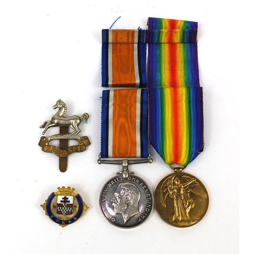 247 - British Military World War I Victory and 1914-18 War medal, together with two badges, the medals awa... 