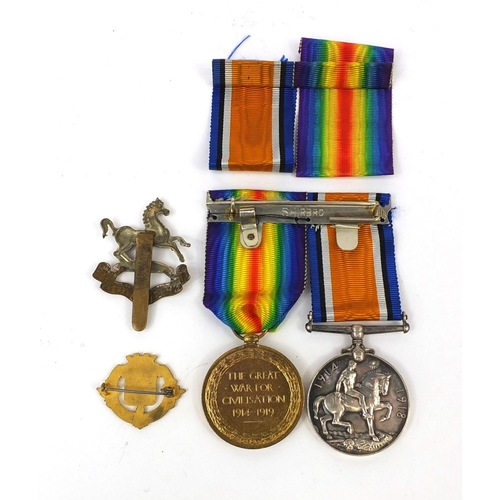 247 - British Military World War I Victory and 1914-18 War medal, together with two badges, the medals awa... 