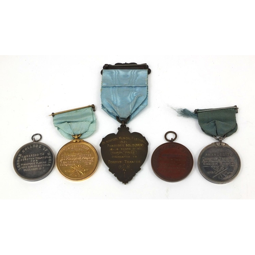 233 - Five early twentieth century music awards, all awarded to Dorothy Tranter comprising four London Col... 