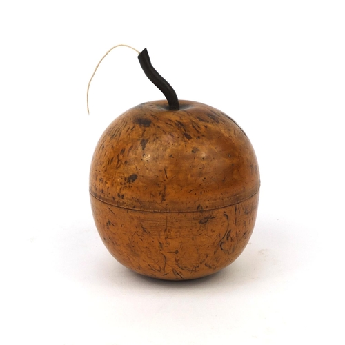 40 - ** DESCRIPTION AMENDED 30/6 ** Treen string box in the form of an apple with brass stork, 12cm high