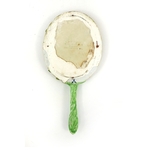 655 - Meissen porcelain hand mirror, with silver plated back, naturalistic handle and hand painted floral ... 