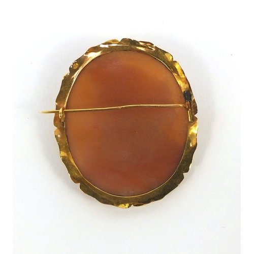 933 - Large cameo maiden head brooch with gold coloured metal mount, indistinct impressed marks to the rev... 