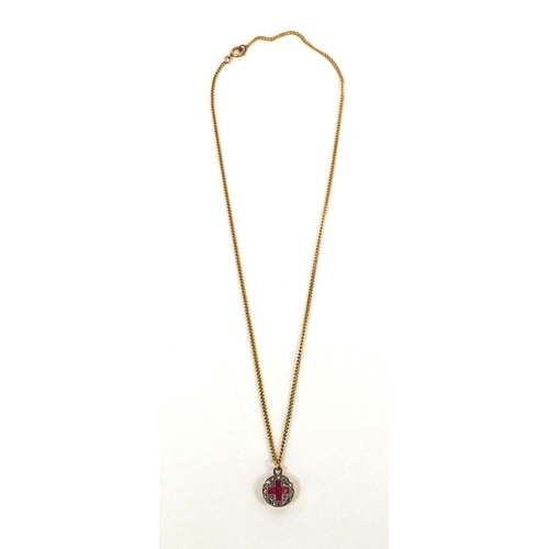 928 - Unmarked gold diamond and ruby red cross pendant, with a 9ct gold necklace, the pendant made for a m... 