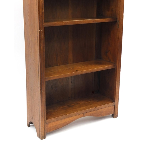 132 - Oak inlaid Arts & Crafts open bookcase fitted with four shelves, 120cm high x 71cm wide x 20cm deep