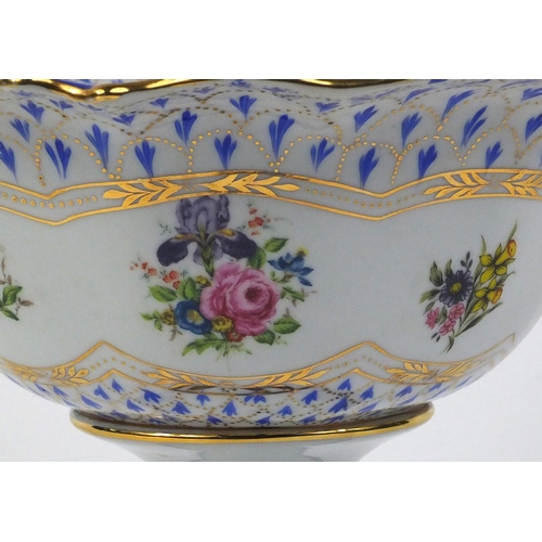 253 - Porcelain pedestal fruit bowl transfer printed with flowers and hand gilded, 20cm high x 28cm in dia... 