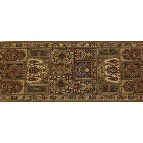 114 - Green and brown ground carpet runner and rug, the rug approximately 180cm x 90cm