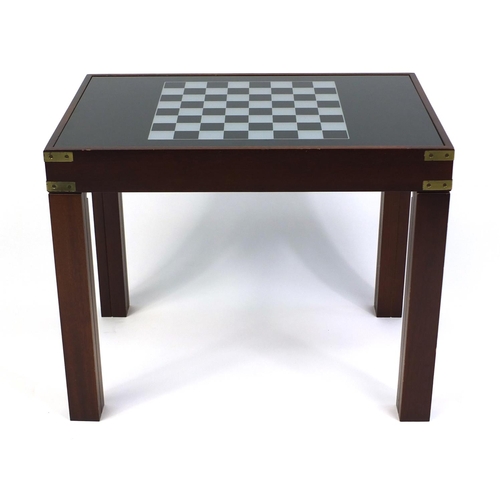 41 - Mahogany games table with glass top with Chess and Back Gammon pieces, 49cm high x 61cm wide x 41cm ... 