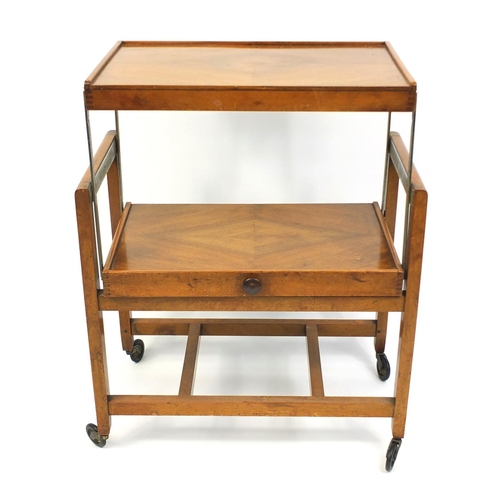 119 - Quarter veneered walnut cantilever tea trolley, 87cm high x 61cm wide x 39cm deep