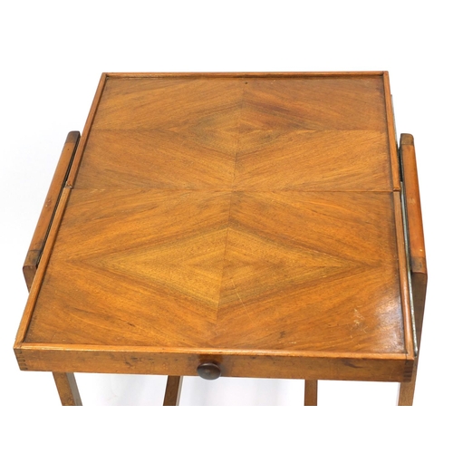 119 - Quarter veneered walnut cantilever tea trolley, 87cm high x 61cm wide x 39cm deep