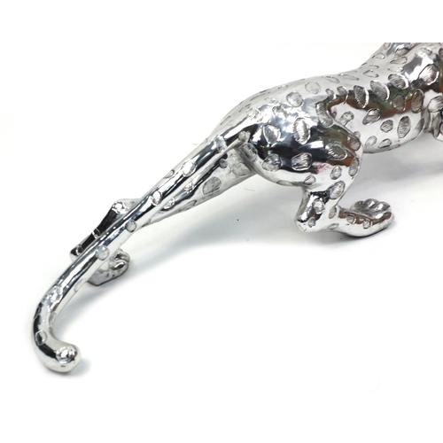 182 - Large decorative silvered leopard, 110cm long