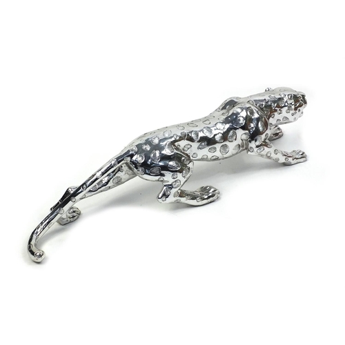 182 - Large decorative silvered leopard, 110cm long