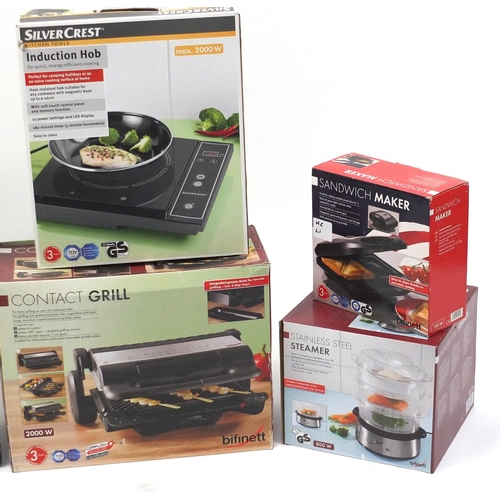 586 - Six boxed kitchen appliances comprising deep fryer, contact grill, induction hob, steamer, sandwich ... 